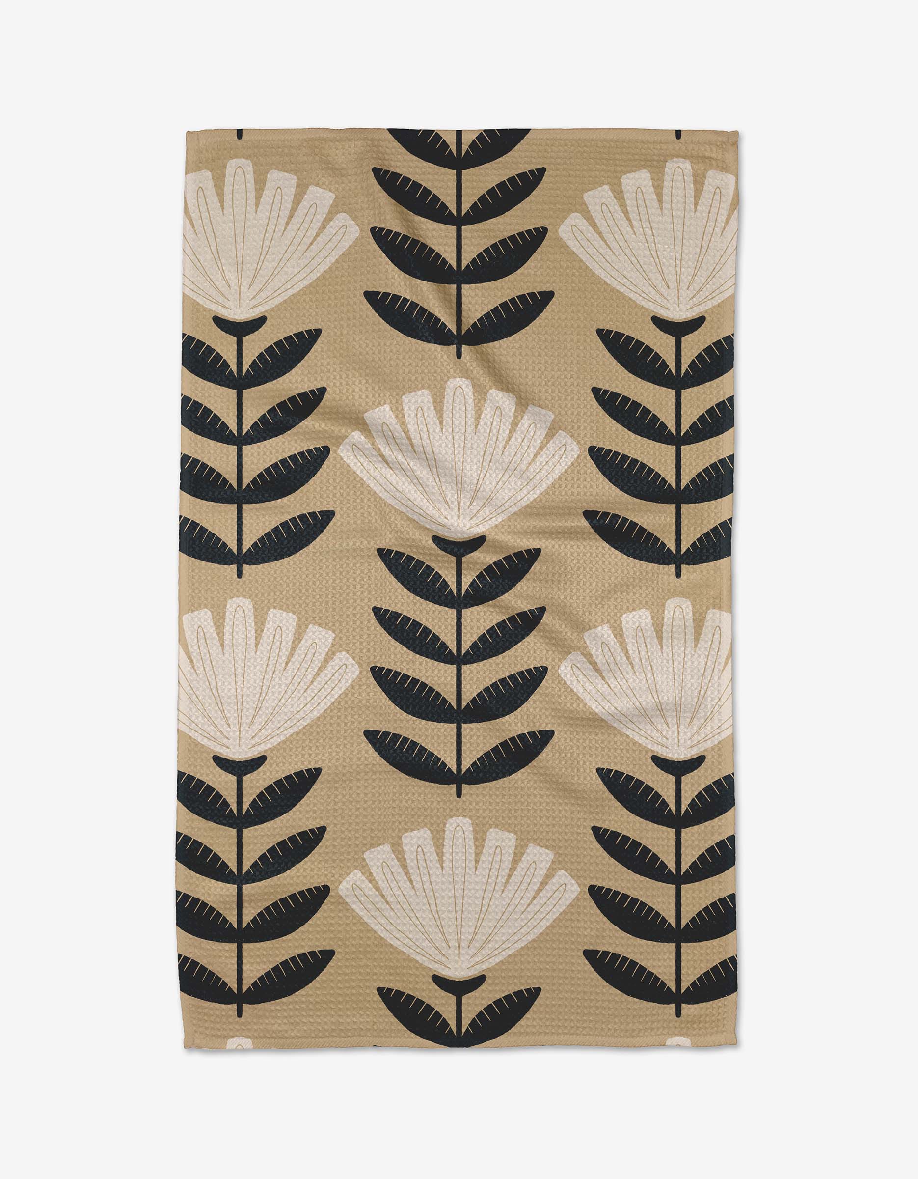 Tan kitchen tea towel with cream floral and black leaf Scandinavian folk pattern