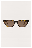 Cat-eye sunglasses with brown tortoise frame featuring yellow flecks and brown lenses