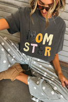 Dark gray graphic tee with colorful Momster text print, relaxed fit
